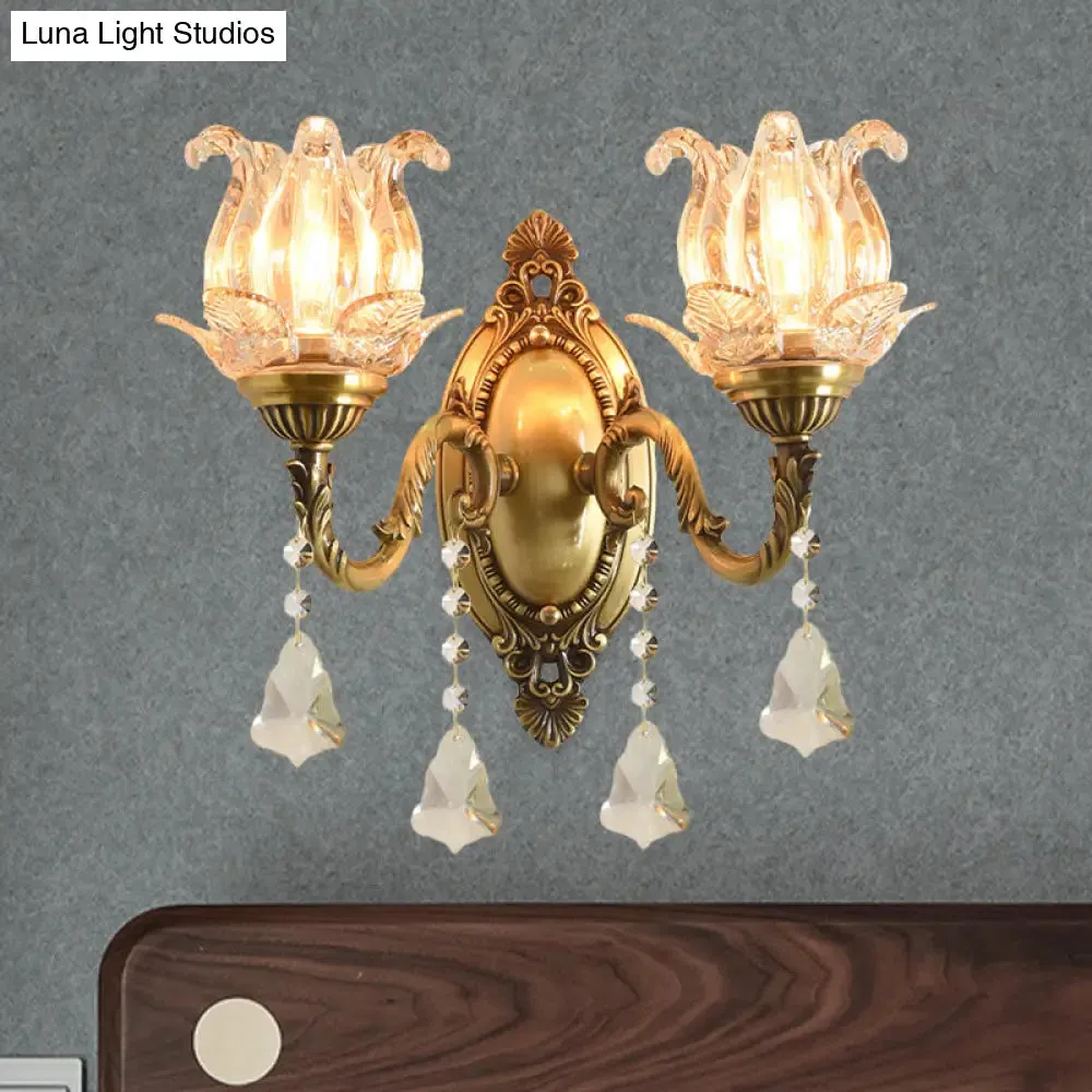 Brass Wall Mount Sconce with Clear Glass 1/2-Light for a Classic Floral Look